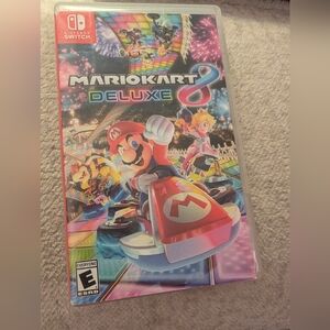 Nintendo Mario Kart 8 Deluxe - Red, Blue, Pink, White